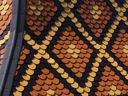 Détail du motif du clocher de Champagney, photo E. Rey