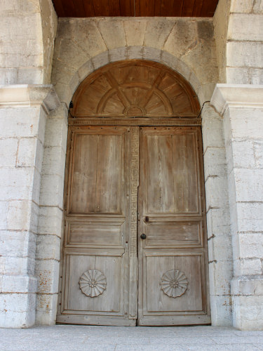 Porte de l'église de La Planée