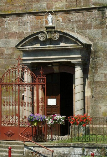 Le porche de l'église de Moffans, photo J. Masset