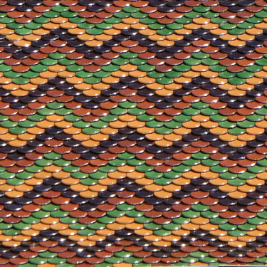 Détail du motif de tuiles du clocher de l'église de Montigny-lès-Vesoul, photo Y. Bessero