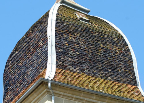 Motif de tuiles du clocher de Pomoy (70) photo J. Masset