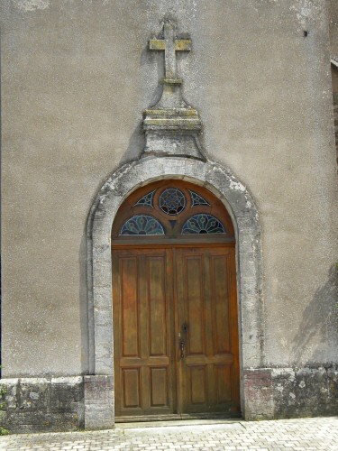 Le porche de l'église de Quenoche, photo D. Bion