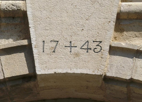 Détail du portail de l'église de Recologne, photo J. Masset